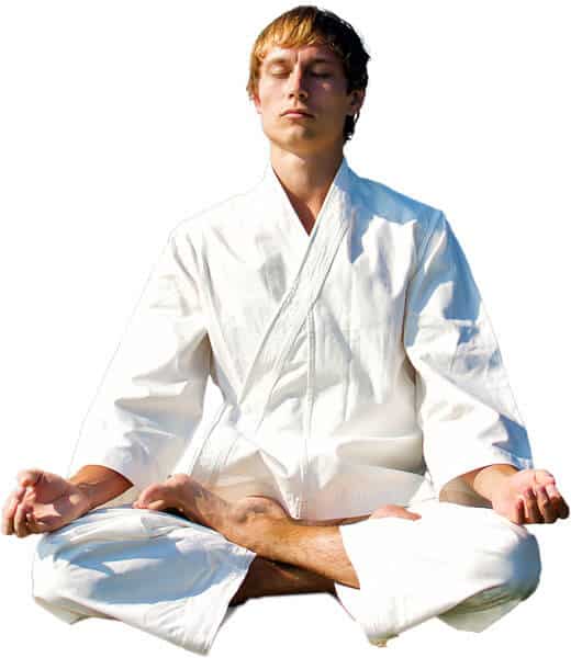 Martial Arts Lessons for Adults in North Plainfield NJ - Young Man Thinking and Meditating in White
