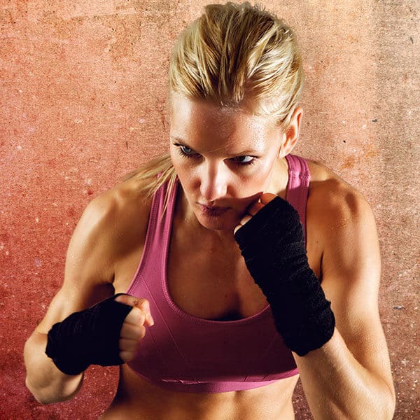 Mixed Martial Arts Lessons for Adults in North Plainfield NJ - Lady Kickboxing Focused Background
